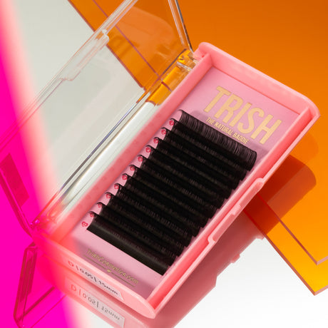 Front view of OG Pink Lash Tray – matte black CC Curl lashes in sleek pink Trish Co packaging Front view of OG Pink Lash Tray – matte black CC Curl lashes in sleek pink Trish Co packaging
