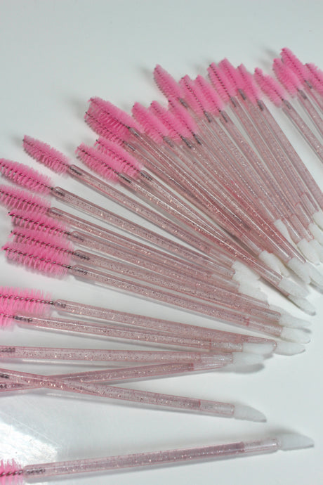 Pink Lash Spoolie and Lip Duo Wand – dual-ended tool for lash grooming and lip gloss application Pink Lash Spoolie and Lip Duo Wand – dual-ended tool for lash grooming and lip gloss application