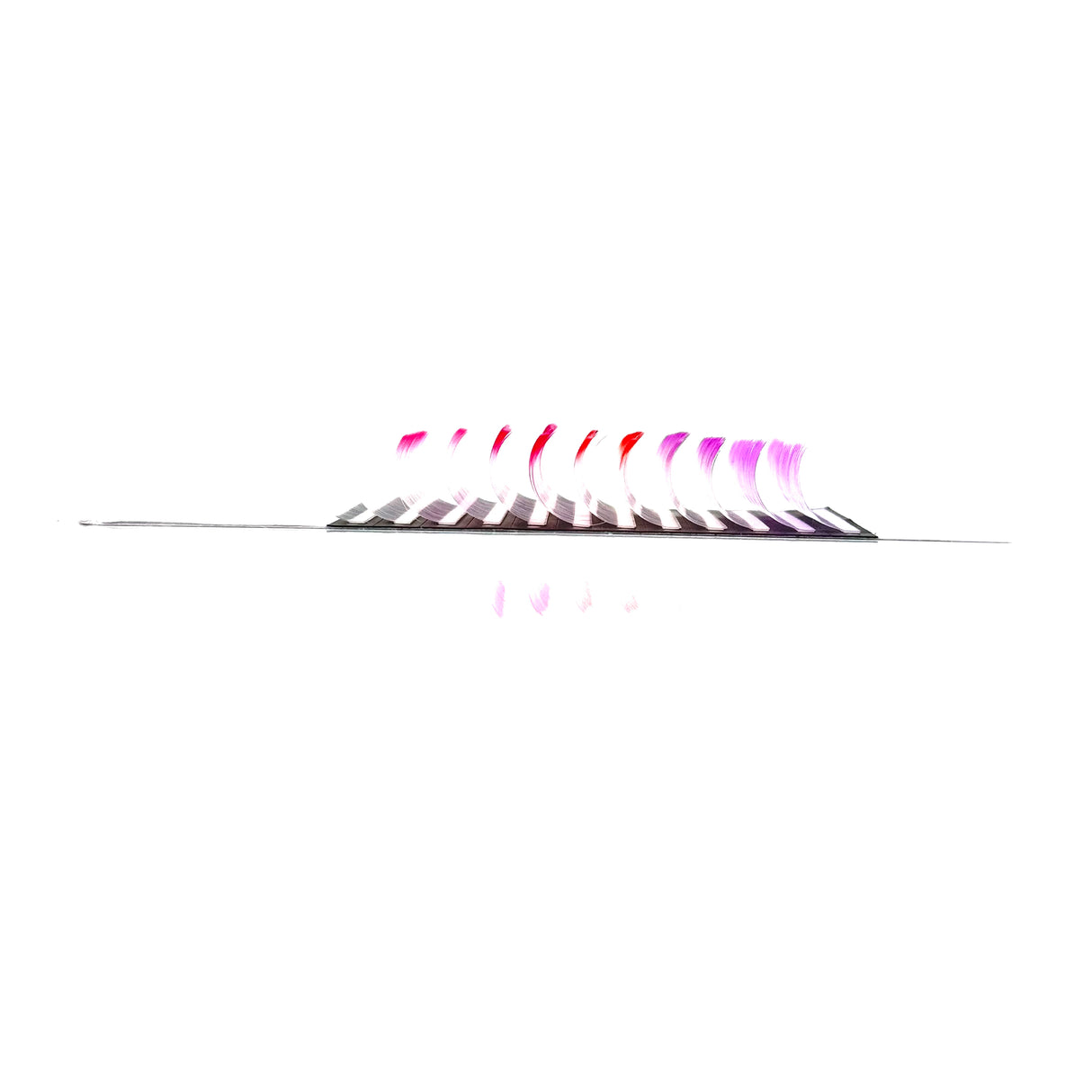 Side angle of White Series Lash Tray with white ombre CC curl .05 lashes in 14–18mm lengths from Trish Co Side angle of White Series Lash Tray with white ombre CC curl .05 lashes in 14–18mm lengths from Trish Co