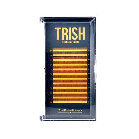Front view of orange bottom lash tray – J curl .05 in mixed lengths 7–12mm by Trish Co Front view of orange bottom lash tray – J curl .05 in mixed lengths 7–12mm by Trish Co