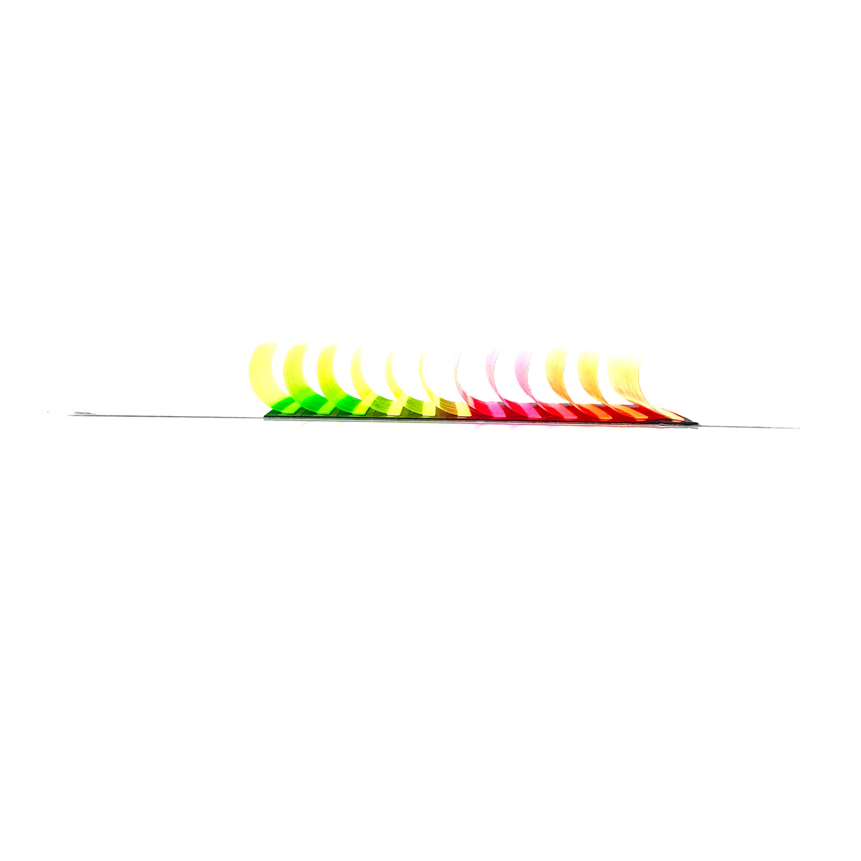 Side angle of Neon Color Lash Tray showing layered neon lashes – pink, green, and yellow CC curl .05 – 14–18mm Side angle of Neon Color Lash Tray showing layered neon lashes – pink, green, and yellow CC curl .05 – 14–18mm