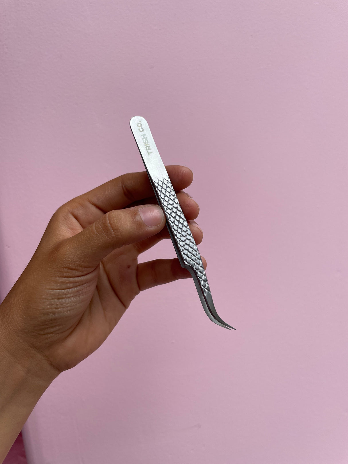 Curved tweezer Curved tweezer