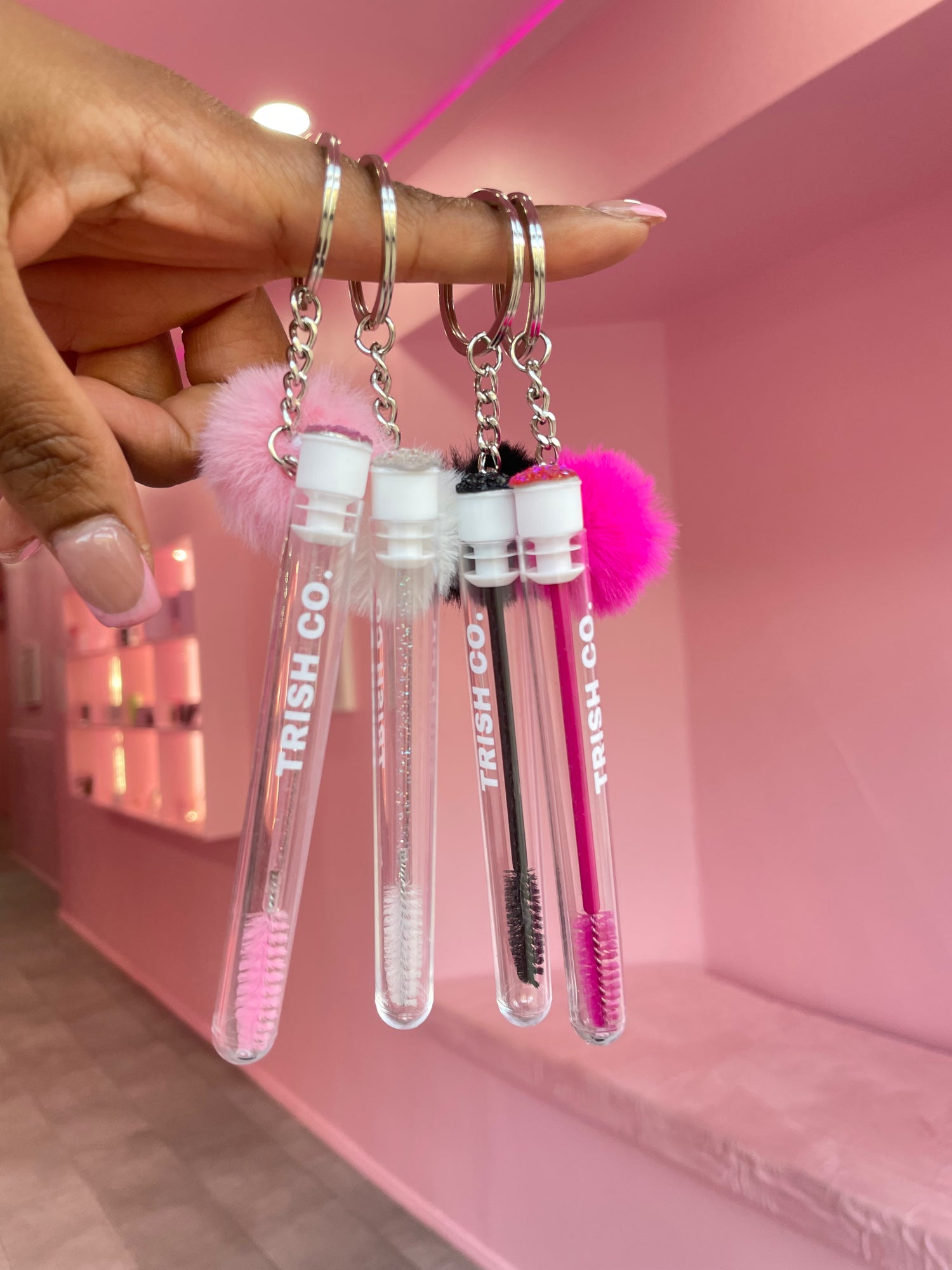 Brush & GO Keychain Spoolie – Travel Lash Brush in White, Black & Pink | Trish Co Brush & GO Keychain Spoolie – Travel Lash Brush in White, Black & Pink | Trish Co