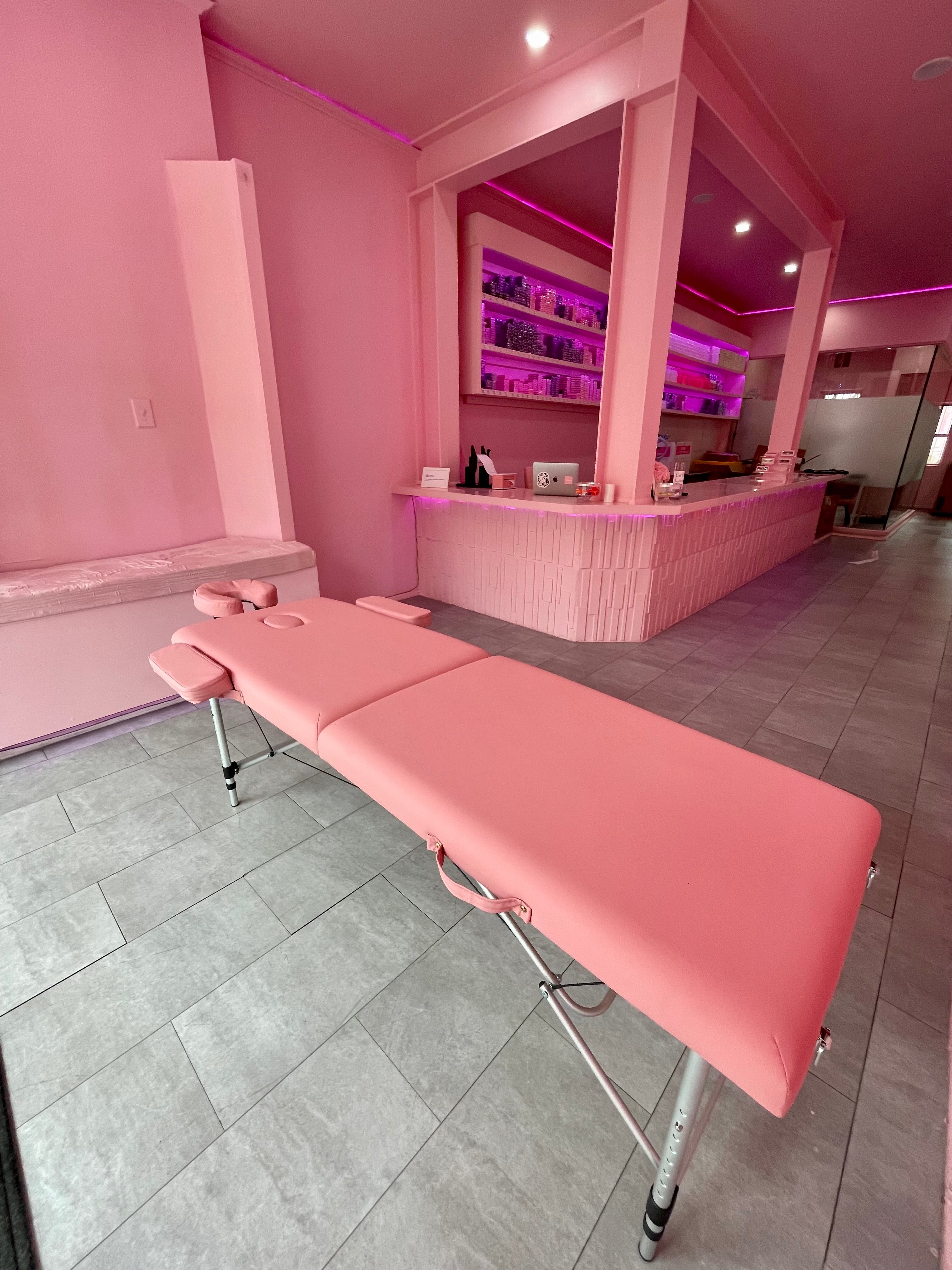Pink massage table